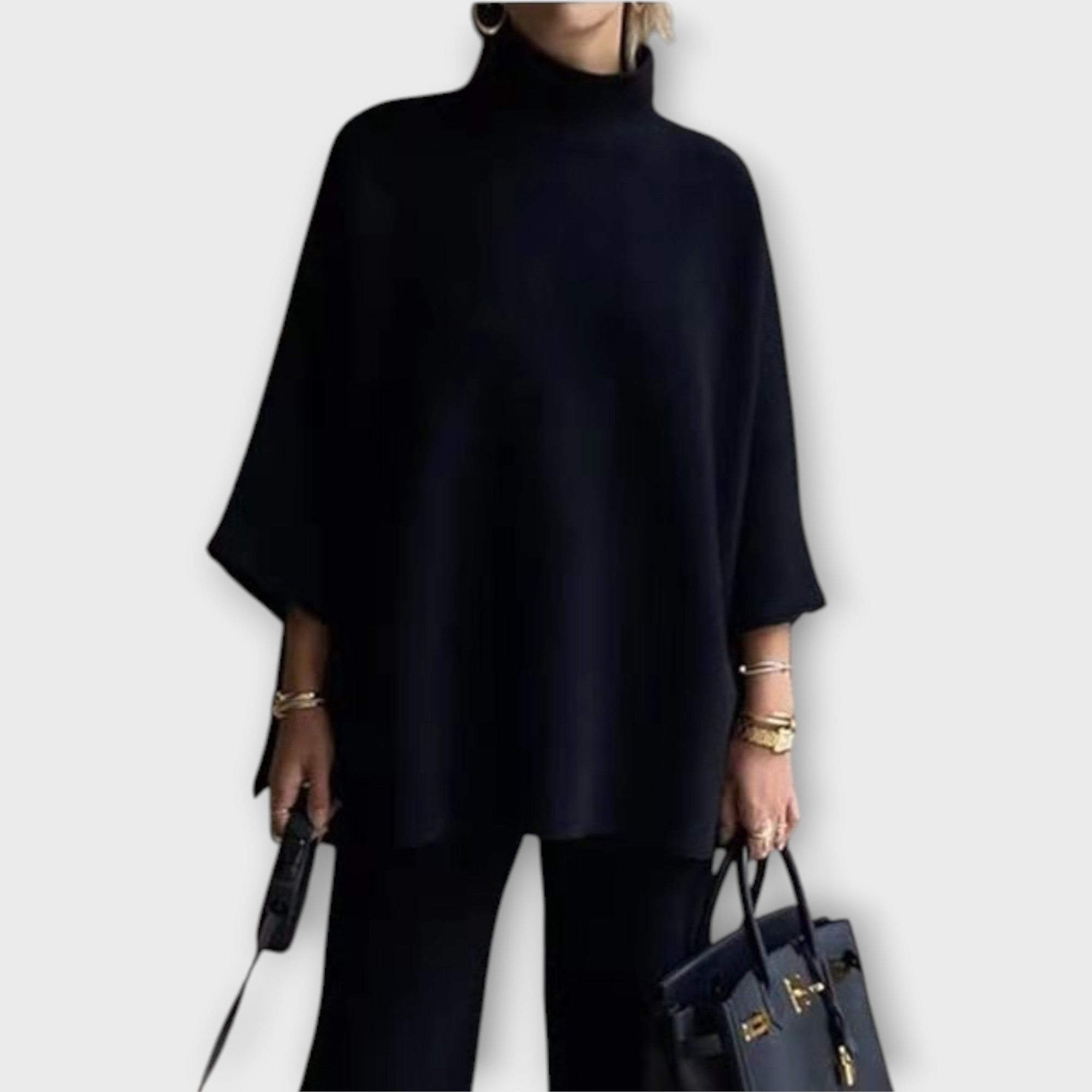 Pletený svetr s volným střihem a rolákem