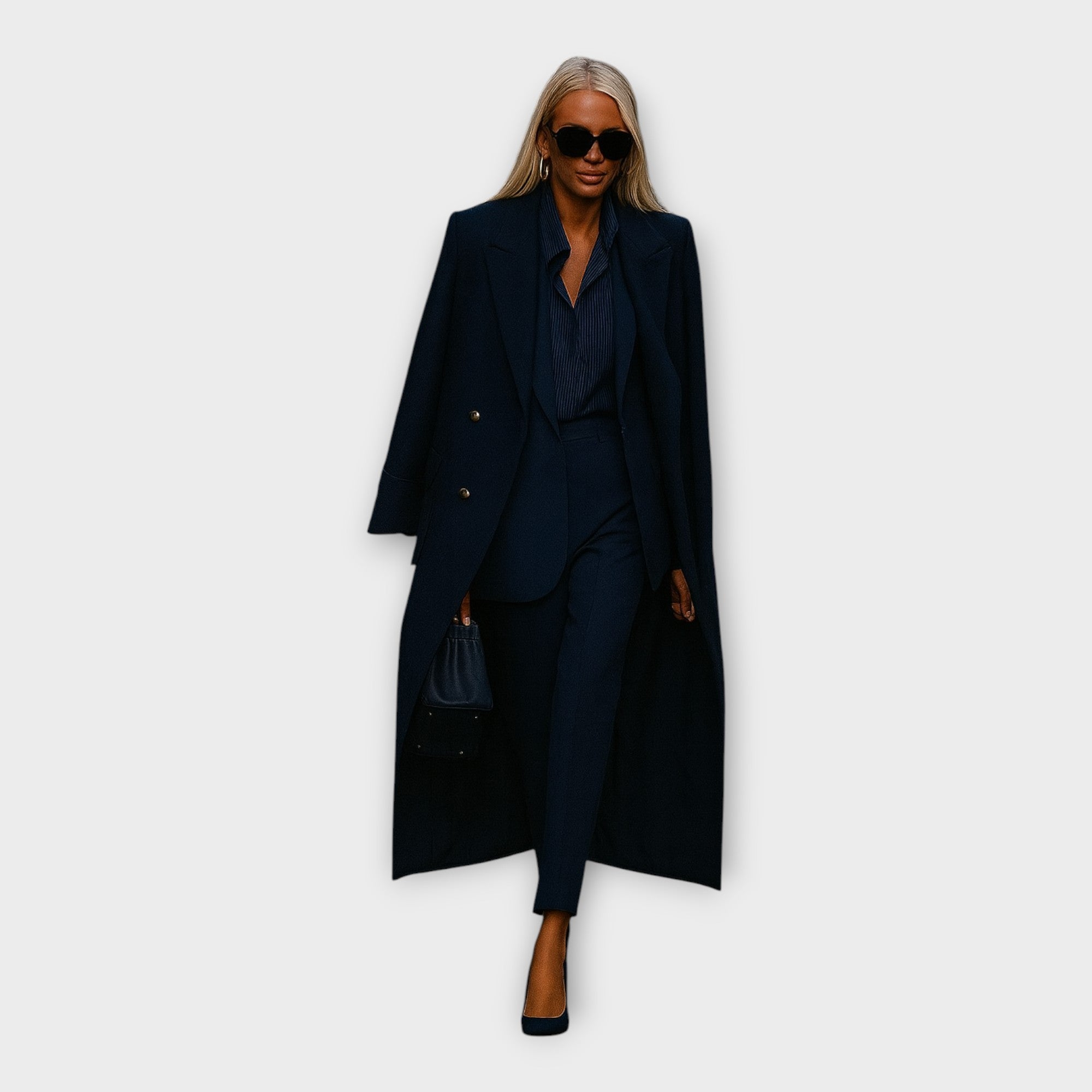 Elegantní souprava s kalhotami a kabátem v minimalistickém stylu