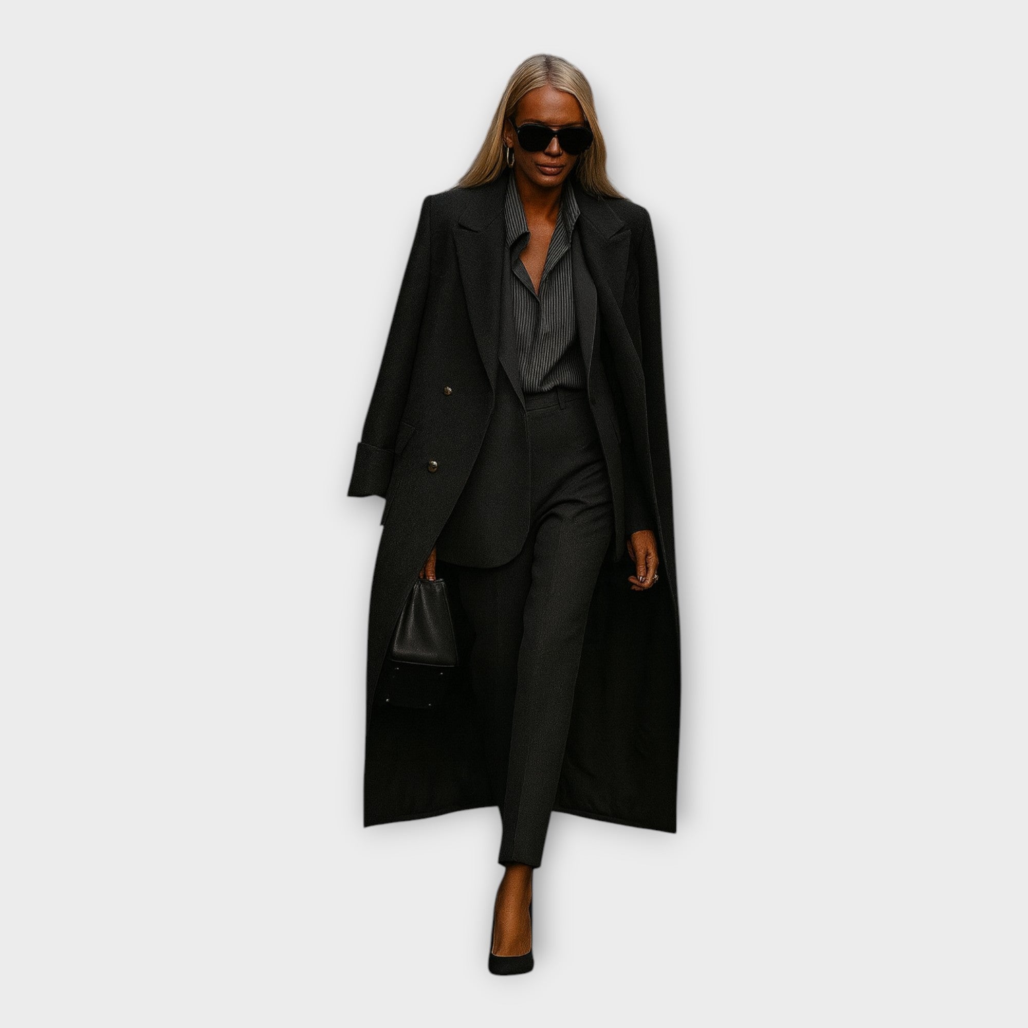 Elegantní souprava s kalhotami a kabátem v minimalistickém stylu